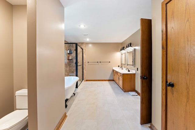 11875 W 700 S, Columbus, IN 47201 - full bathroom featuring vanity, a shower stall, a soaking tub, recessed lighting, and toilet