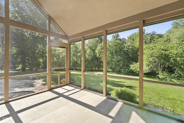 11875 W 700 S, Columbus, IN 47201 - unfurnished sunroom with view of wooded area and vaulted ceiling