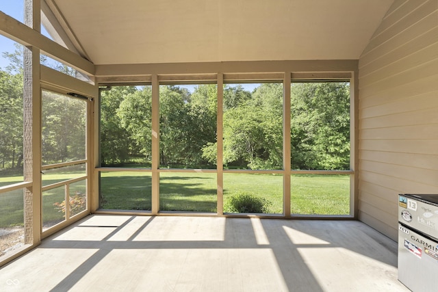 11875 W 700 S, Columbus, IN 47201 - unfurnished sunroom with vaulted ceiling and view of scattered trees