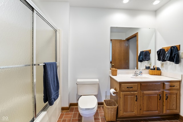 11875 W 700 S, Columbus, IN 47201 - bathroom featuring vanity, toilet, recessed lighting, enclosed tub / shower combo, and baseboards