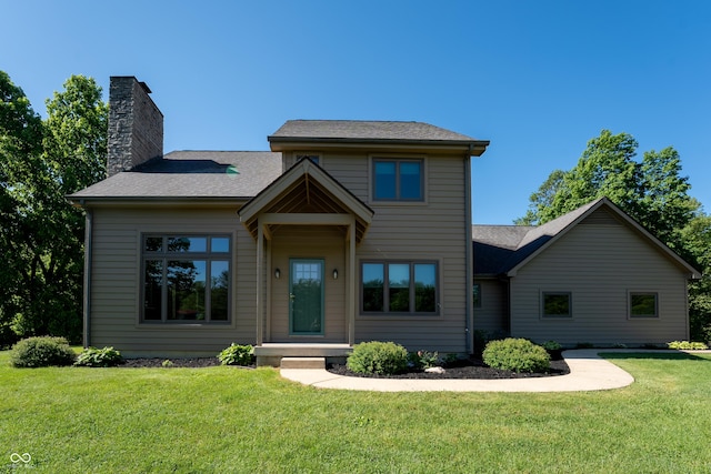 11875 W 700 S, Columbus, IN 47201 - view of front of home with a chimney and a front lawn