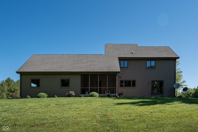 11875 W 700 S, Columbus, IN 47201 - rear view of property with a yard, a sunroom, and roof with shingles