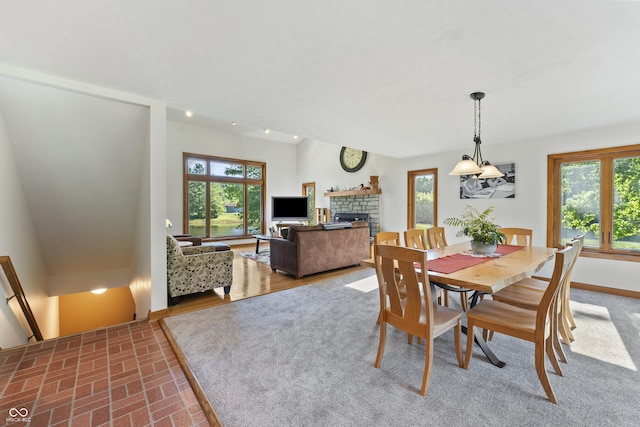 11875 W 700 S, Columbus, IN 47201 - dining room featuring a stone fireplace and baseboards