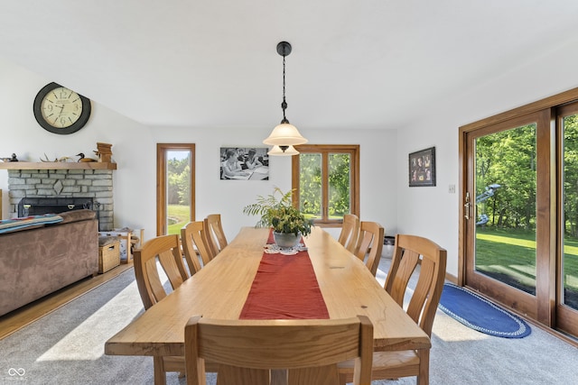 11875 W 700 S, Columbus, IN 47201 - dining area featuring healthy amount of natural light and a fireplace