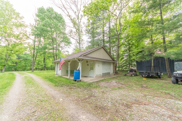 5821 Bittersweet Rd, Morgantown, IN 46160 - detached garage featuring driveway