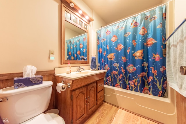 5821 Bittersweet Rd, Morgantown, IN 46160 - bathroom with toilet, vanity, shower / tub combo with curtain, and wood finished floors