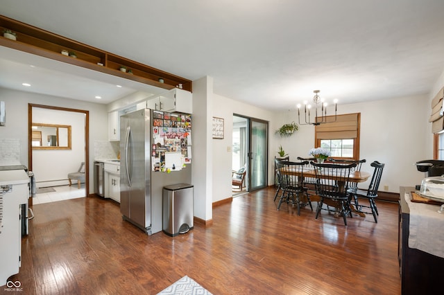 1495 E 240 N, Anderson, IN 46012 - dining space with dark wood-type flooring, a chandelier, baseboards, a baseboard heating unit, and recessed lighting
