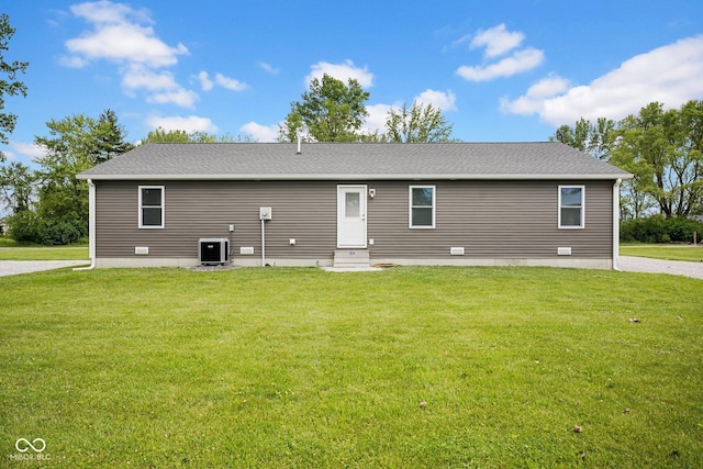1295 Colonial Dr, Seymour, IN 47274 - back of house featuring entry steps and a lawn