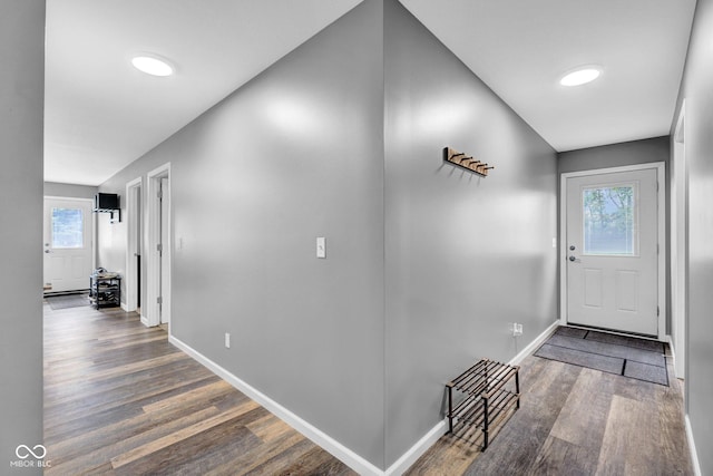1295 Colonial Dr, Seymour, IN 47274 - entrance foyer with wood finished floors and healthy amount of natural light