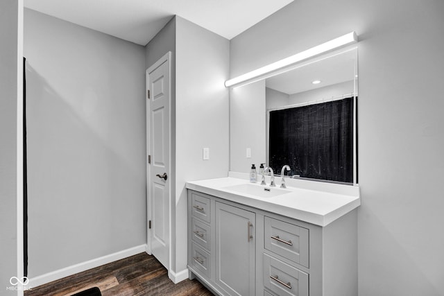 1295 Colonial Dr, Seymour, IN 47274 - full bath featuring vanity and wood finished floors