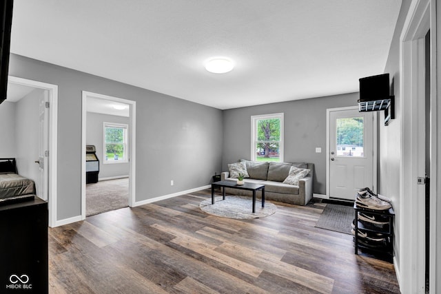 1295 Colonial Dr, Seymour, IN 47274 - living area with wood finished floors and healthy amount of natural light