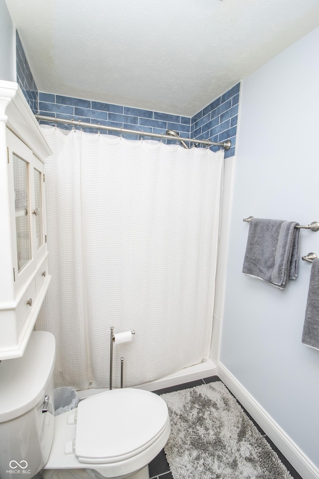 917 E Mill Creek Rd S, Greensburg, IN 47240 - bathroom with toilet and curtained shower