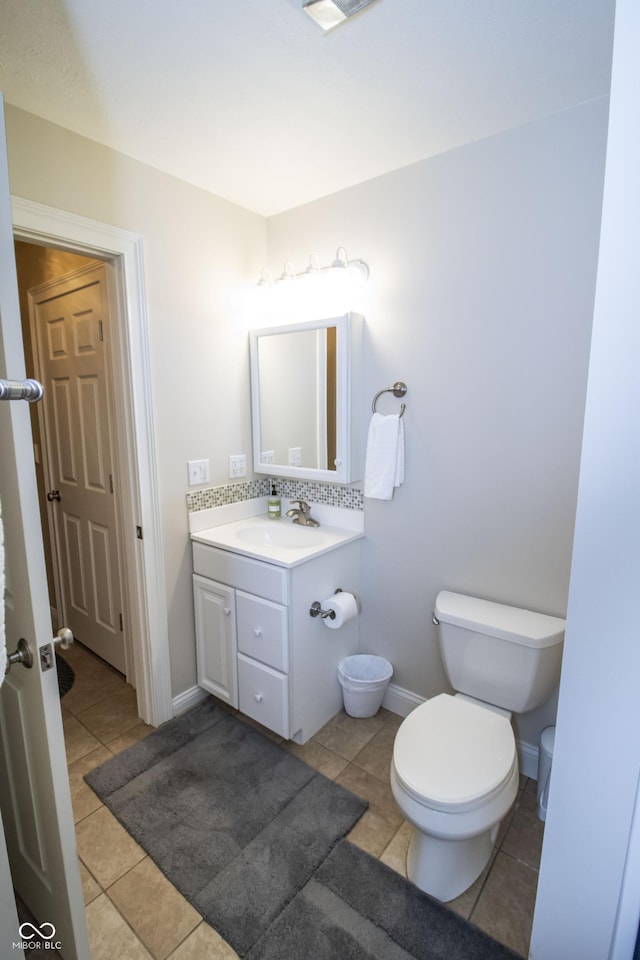 917 E Mill Creek Rd S, Greensburg, IN 47240 - half bath with tile patterned floors, toilet, vanity, and baseboards