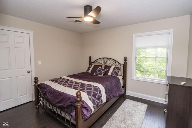 917 E Mill Creek Rd S, Greensburg, IN 47240 - bedroom with dark wood finished floors, baseboards, and a ceiling fan