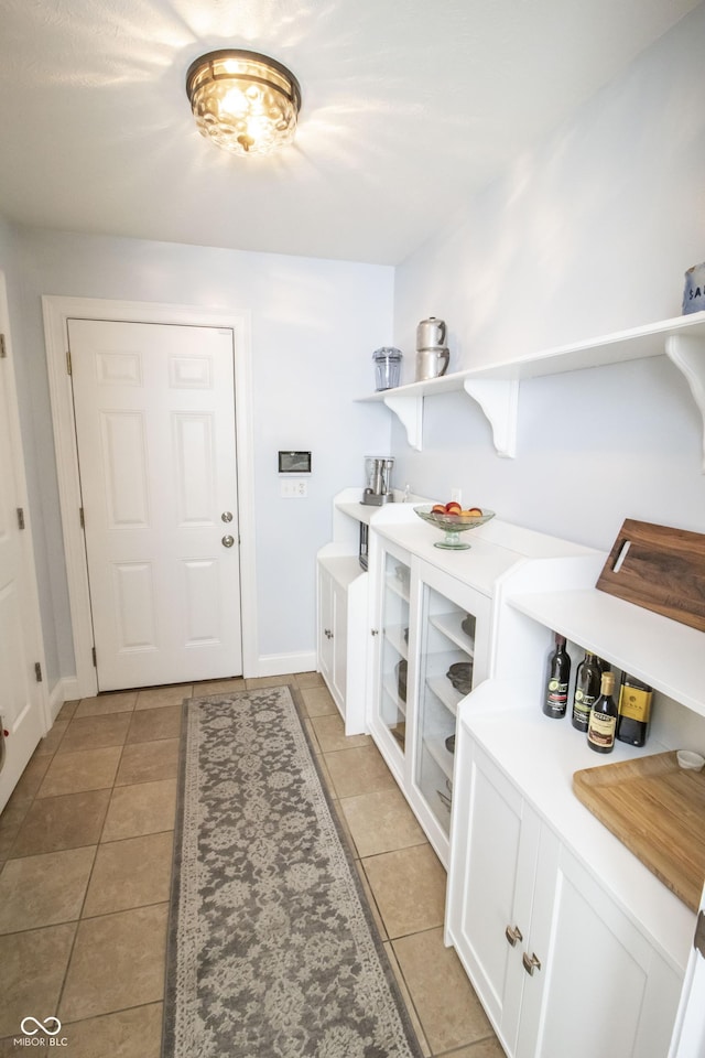 917 E Mill Creek Rd S, Greensburg, IN 47240 - mudroom featuring light tile patterned flooring and baseboards