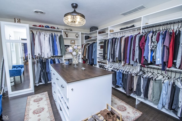 917 E Mill Creek Rd S, Greensburg, IN 47240 - spacious closet featuring dark wood finished floors and a chandelier