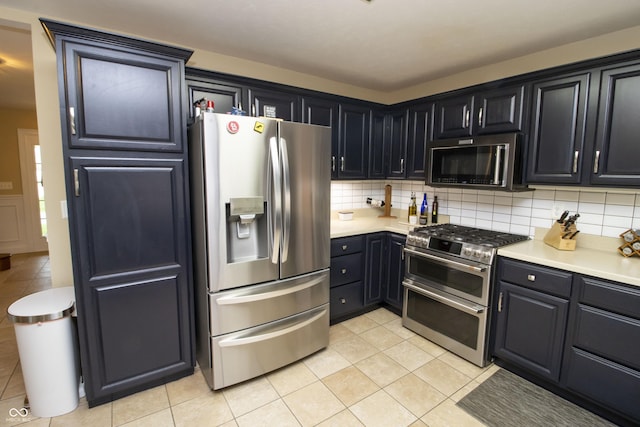 917 E Mill Creek Rd S, Greensburg, IN 47240 - kitchen featuring stainless steel appliances, backsplash, and light countertops