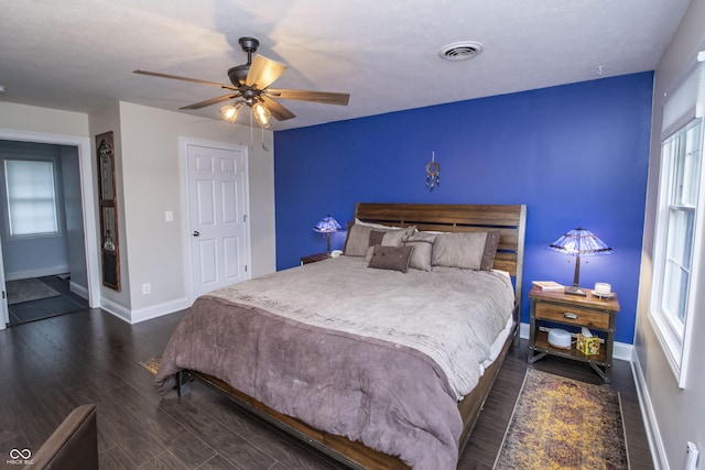 917 E Mill Creek Rd S, Greensburg, IN 47240 - bedroom featuring baseboards, dark wood finished floors, and a ceiling fan