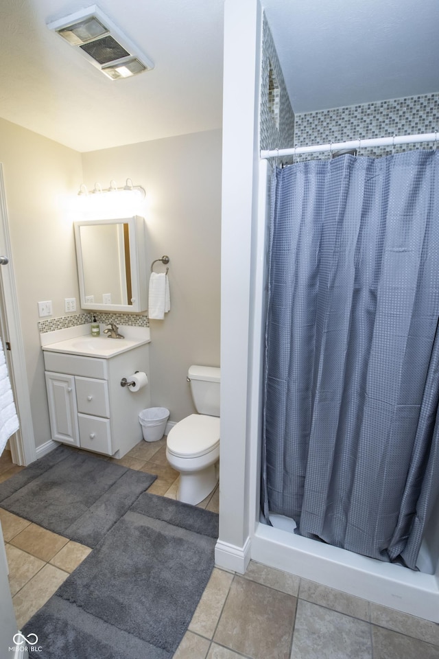 917 E Mill Creek Rd S, Greensburg, IN 47240 - full bath featuring toilet, vanity, a shower stall, and tile patterned flooring