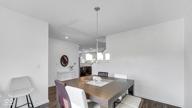 9717 Chuckwalla Pl, Fishers, IN 46040 - dining room with dark wood-style flooring, baseboards, a chandelier, and recessed lighting