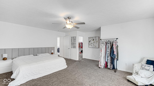 9717 Chuckwalla Pl, Fishers, IN 46040 - carpeted bedroom featuring baseboards, ceiling fan, and a textured ceiling