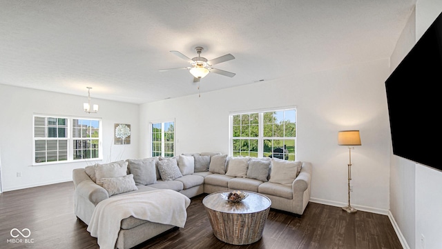 9717 Chuckwalla Pl, Fishers, IN 46040 - living room featuring baseboards, dark wood-type flooring, and ceiling fan