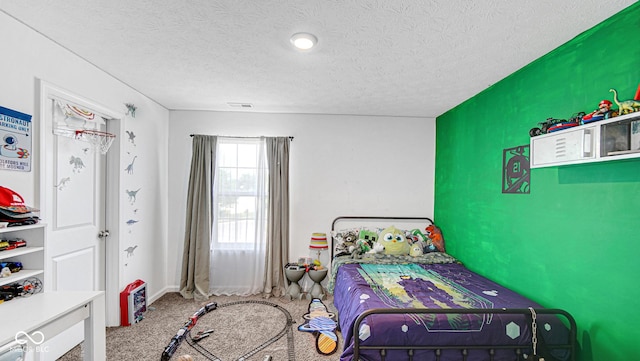 9717 Chuckwalla Pl, Fishers, IN 46040 - bedroom featuring carpet flooring and a textured ceiling