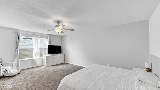 9717 Chuckwalla Pl, Fishers, IN 46040 - bedroom featuring carpet flooring, ceiling fan, baseboards, and a textured ceiling