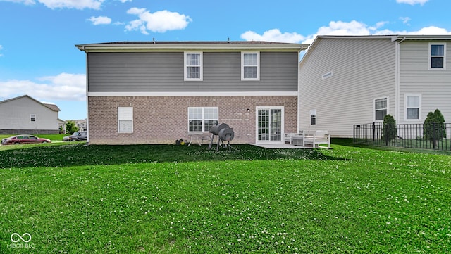 9717 Chuckwalla Pl, Fishers, IN 46040 - rear view of house with brick siding and a patio