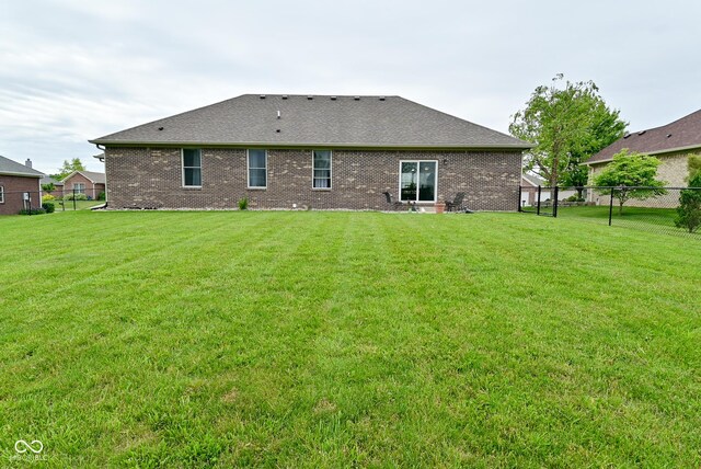 2330 Oak Dr, Clayton, IN 46118 - back of property with brick siding and roof with shingles