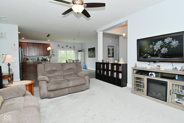 2330 Oak Dr, Clayton, IN 46118 - carpeted living room with ceiling fan and baseboards