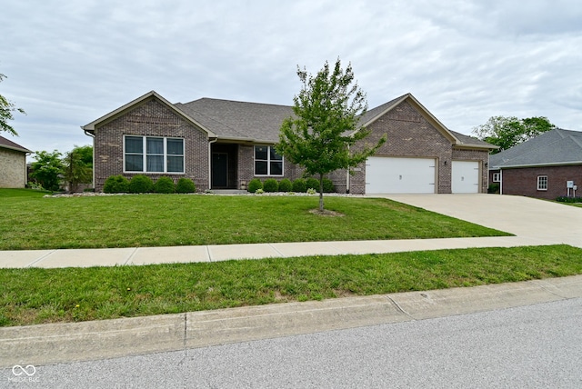 2330 Oak Dr, Clayton, IN 46118 - view of front of home with brick siding, a garage, concrete driveway, and a front yard