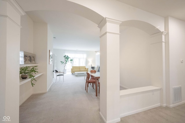 9117 Thoreau Ct, Fishers, IN 46037 - corridor with carpet, ornate columns, and arched walkways
