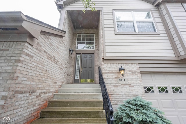9117 Thoreau Ct, Fishers, IN 46037 - property entrance featuring brick siding