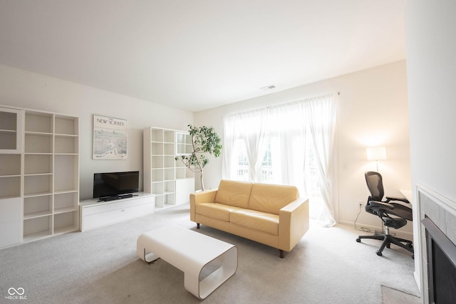 9117 Thoreau Ct, Fishers, IN 46037 - carpeted living room with an office area