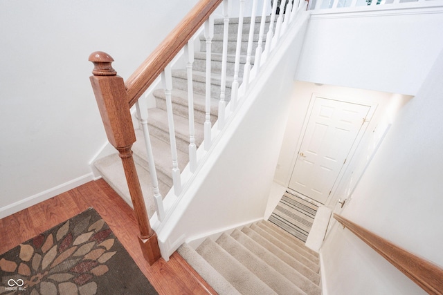 9117 Thoreau Ct, Fishers, IN 46037 - staircase featuring wood finished floors and baseboards
