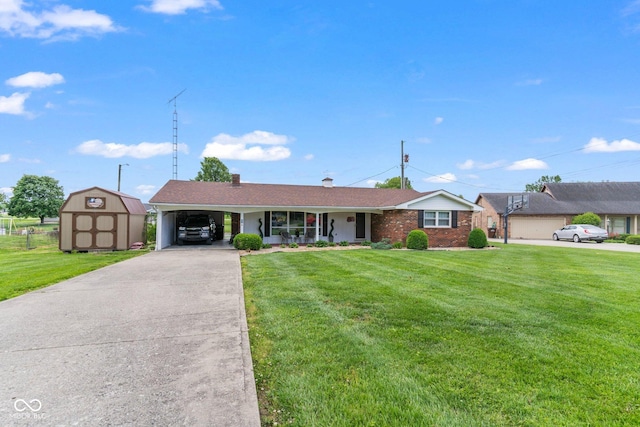 2137 W Bobwhite Dr, Scottsburg, IN 47170 - single story home with driveway, a front lawn, a carport, a chimney, and brick siding