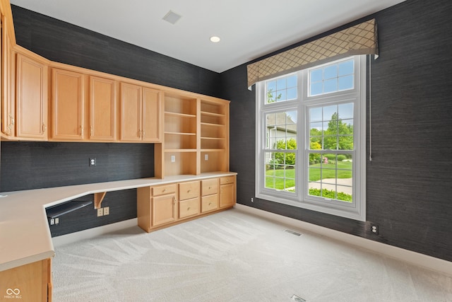 11065 Spice Ln, Fishers, IN 46037 - unfurnished office with built in desk, light colored carpet, and wallpapered walls