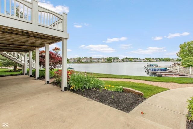 11065 Spice Ln, Fishers, IN 46037 - view of patio / terrace featuring a water view and stairway