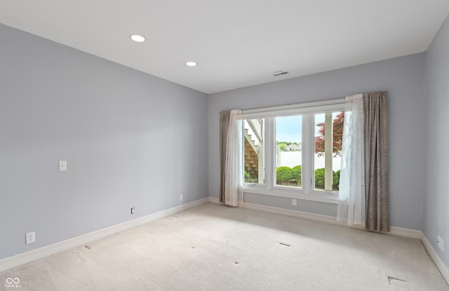 11065 Spice Ln, Fishers, IN 46037 - spare room with carpet and recessed lighting