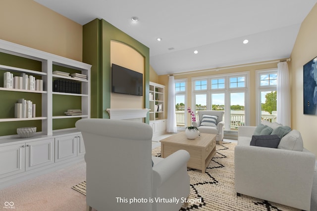 11065 Spice Ln, Fishers, IN 46037 - living area with vaulted ceiling, recessed lighting, and built in shelves
