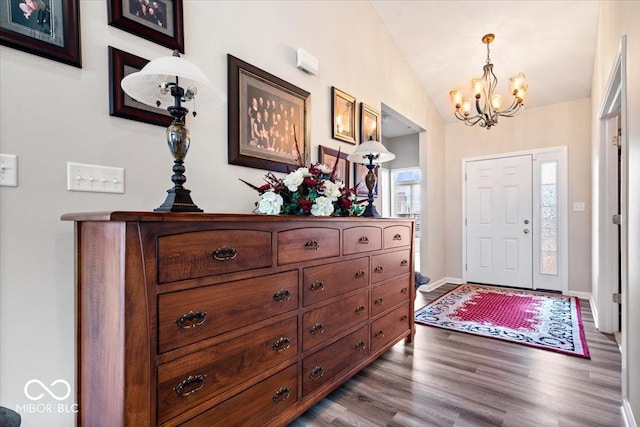 1539 Hazy Falls Blvd, Westfield, IN 46074 - foyer entrance featuring a chandelier, dark wood-type flooring, lofted ceiling, and baseboards