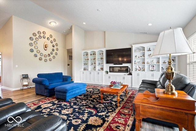 1539 Hazy Falls Blvd, Westfield, IN 46074 - living area with wood finished floors, high vaulted ceiling, and baseboards