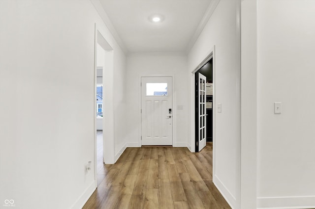 1364 Chatham Hills Blvd, Westfield, IN 46074 - foyer entrance with light wood-style floors, baseboards, and crown molding