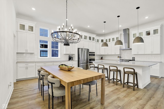 1364 Chatham Hills Blvd, Westfield, IN 46074 - dining space with a chandelier, light wood-type flooring, recessed lighting, and baseboards