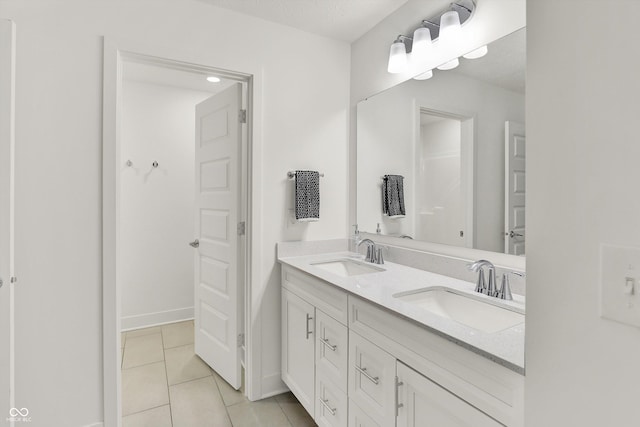 1364 Chatham Hills Blvd, Westfield, IN 46074 - full bath featuring double vanity, tile patterned flooring, and baseboards