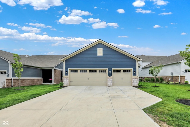 1364 Chatham Hills Blvd, Westfield, IN 46074 - view of front of house featuring brick siding, a garage, driveway, and a front yard