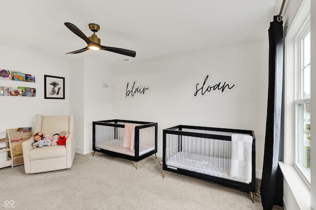 1364 Chatham Hills Blvd, Westfield, IN 46074 - carpeted bedroom featuring multiple windows, a crib, and a ceiling fan