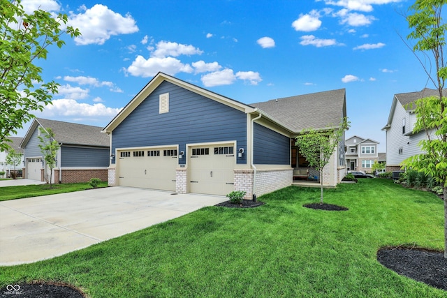 1364 Chatham Hills Blvd, Westfield, IN 46074 - view of front facade featuring brick siding, driveway, a garage, and a front lawn