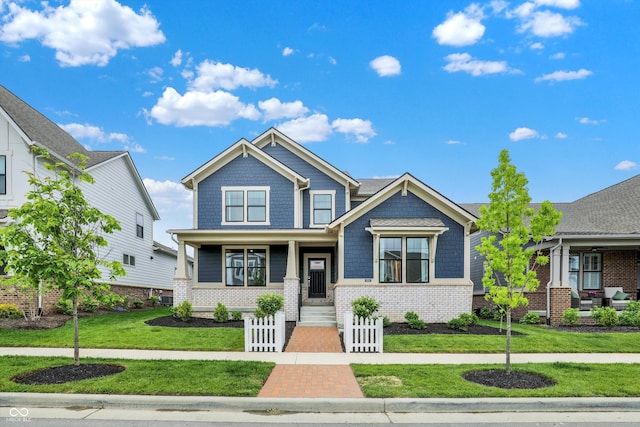 1364 Chatham Hills Blvd, Westfield, IN 46074 - craftsman-style house featuring covered porch, a front lawn, and brick siding